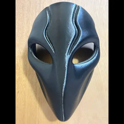 Front real product photo of the black minimalist dark alien mask