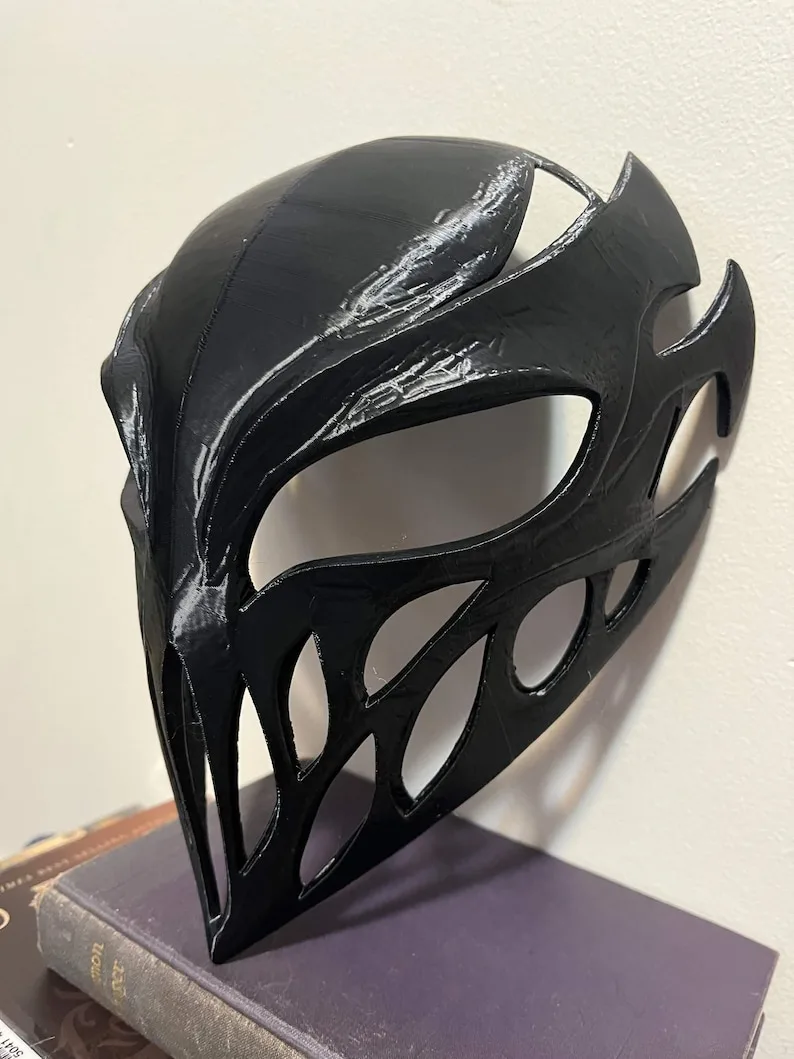 Angled real product photo of the black demon knight mask