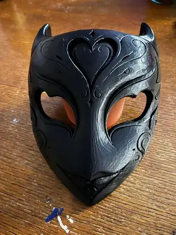 Front real product photo of the black Valentine devil mask