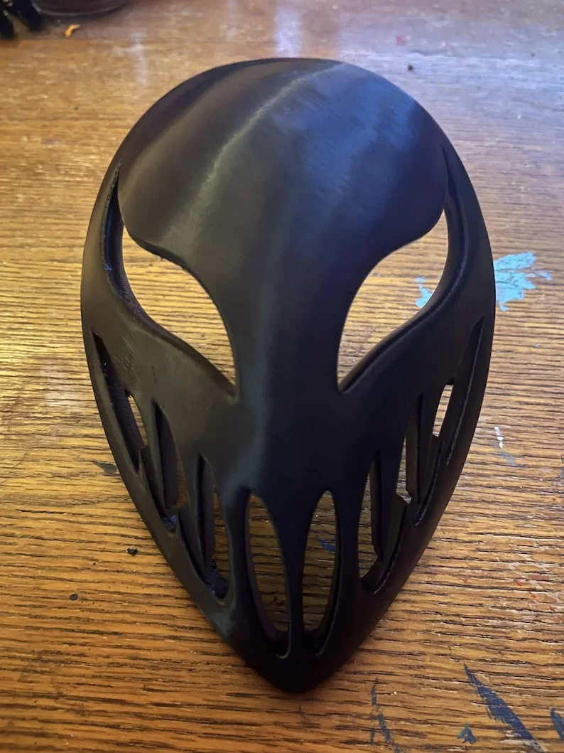Front real product photo of the black villain cartoon mask